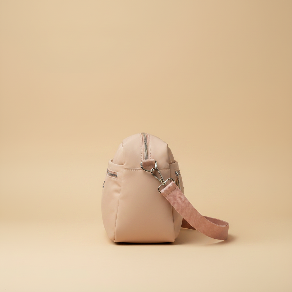Vista laterale profilo - borsa Coveri nylon rosa