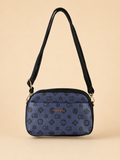 Borsa a tracolla Charro blu scuro e nera su fondo beige sabbia
